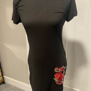 Black mini dress w/flower detail